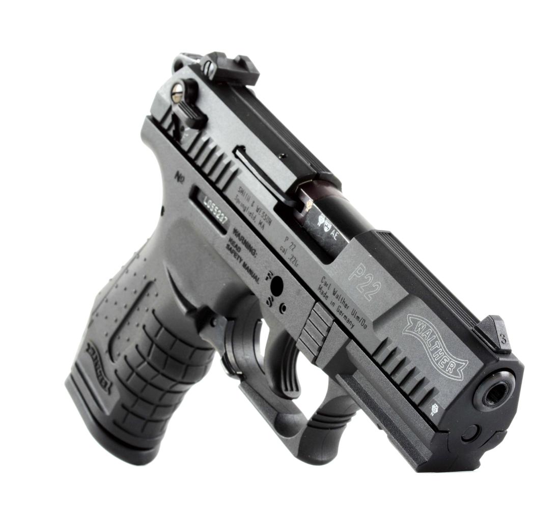 (M) Cased Walther Model P22 Semi-Automatic Pistol.: Manufactured by Carl Walther for Smith & Wesson. It is a magazine fed, semi-automatic, double action with combat sights, alloy frame and black composite grips in as new condition inside and out. Origi