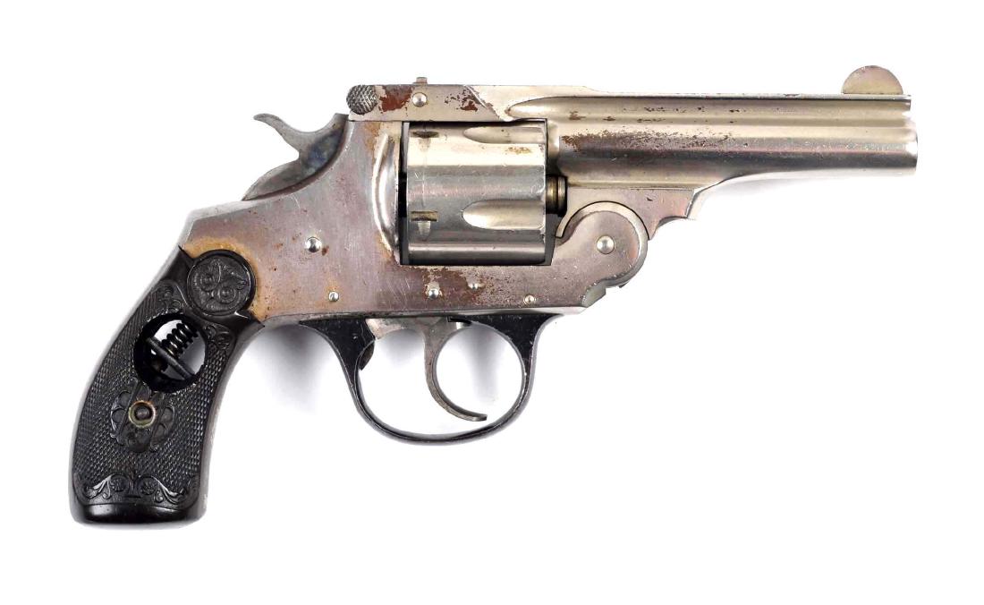(C) I. Johnson Factory Cut-A-Way Tip-Up Revolver.: .32 caliber with a 3-1/4" barrel. This is an extremely scarce factory cut-a-way tip-up double action .32 caliber revolver. These were manufactured with various cut outs in the metal to display the inn