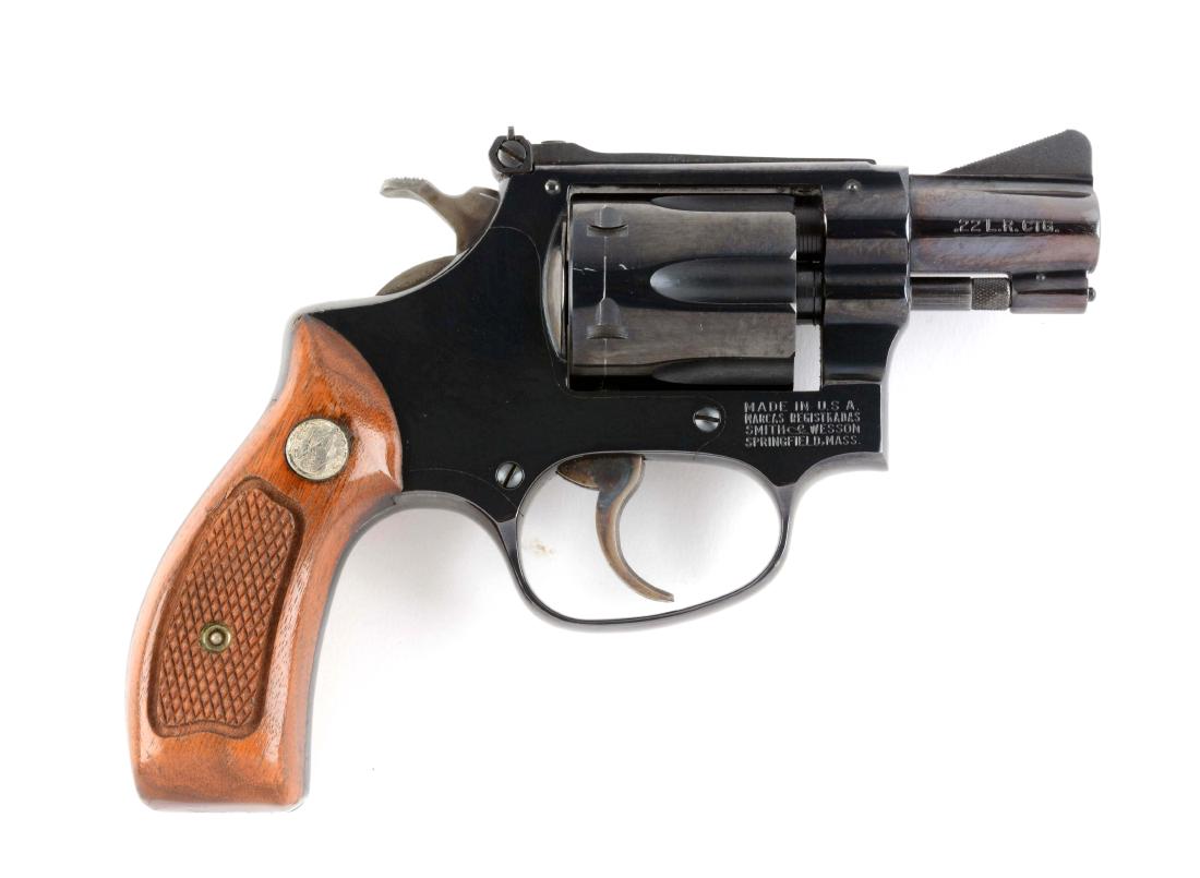 (M) S&W Model 34-1 Double Action Revolver.: The Model 34 was referred to as the Model of 1953 .22/.32 Kit gun. Features six shot, fluted cylinder, pinned barrel, recessed chamber, adjustable rear sight, ramp front, case colored hammer and trigg