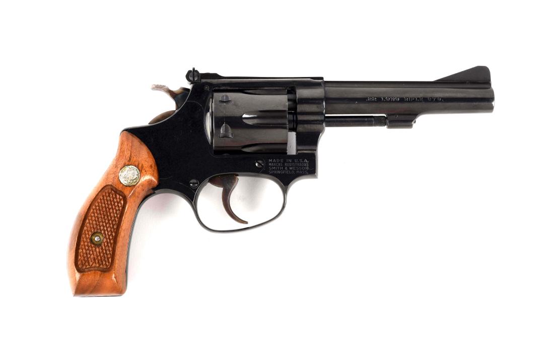 (M) Boxed S&W Model 34-1 Double Action Revolver.: The Model 34 is referred to as the Model of 1953 .22/.32 Kit gun. The M serial prefix began in 1969. The pinned barrel was eliminated in 1982, so this revolver was made between 1982 and 1987. Has the