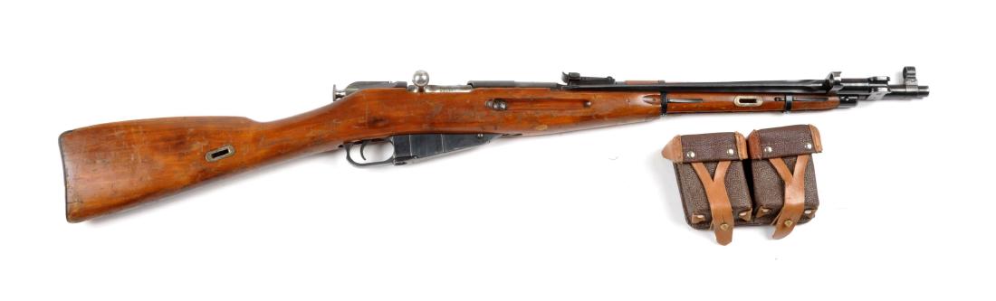 (C) Mosin Nagant M44 1955 Carbine.: This handy little Russian carbine is chambered for the 7.62x54 cartridge. Bolt matches frame, barrel, buttplate and trigger guard. It is missing the ramrod. Has a 21-1/2" barrel, blued finish, hardwoo