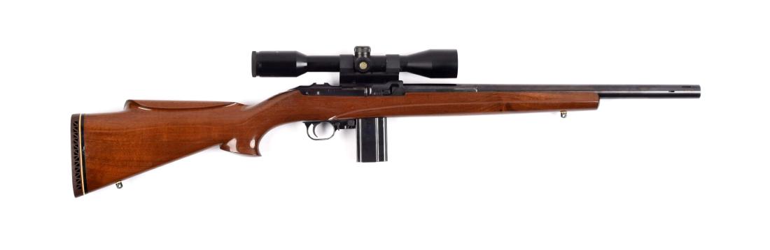(M) Custom M1 Carbine Target Rifle.: The basis for this conversion was a Universal M1 carbine receiver. A short heavy barrel was installed with no provision for sights and a ported muzzle. The custom pistol grip walnut half stock with ro