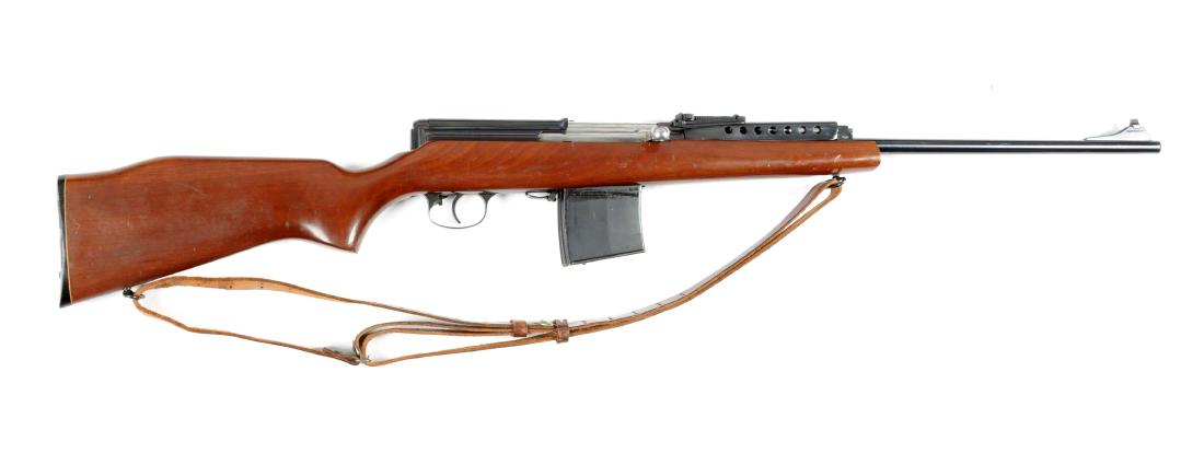 (C) Globe Firearms Custom Russian Tokarev: Globe Firearms converted/custom made this sporting rifle using a vintage Russian Tokarev action and installed a new barrel chambered for the .303 British with ramp front sight. Has custom one piece pi