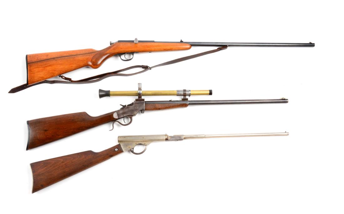 (C) Lot of 3: .22 Caliber Single Shot Rifles.: Gun (A) is a high quality, single shot, bolt action stalking rifle with butterknife bolt. Sporting sights, blued finish, pistol grip half stock, black composite logo buttplate and original sling. Wood