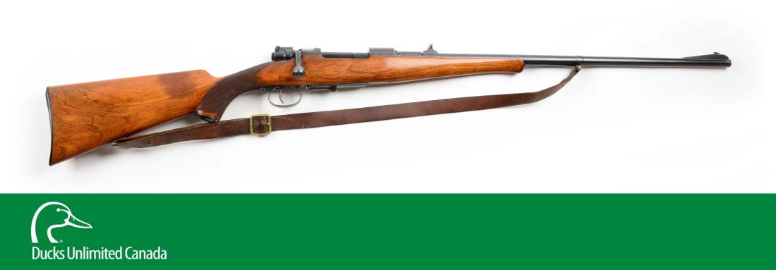 (C^) German Mauser Factory Half Stock Sporting Rifle.: Features round barrel, ramp front sight, three leaf folding rear sight, standard round bolt knob, Schnabel forend tip, square knob checkered pistol grip stock with straight comb, roll-over cheek piece