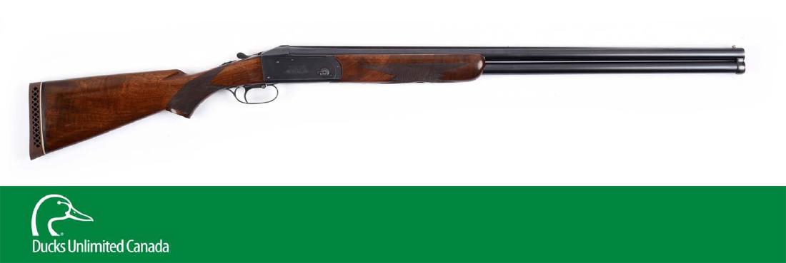(C^) High Condition Remington Model 32 O/U Shotgun.: The Model 32 was manufactured from 1932 - 1942, hence the "Model 32". Blued separated steel barrels with solid matte rib and twin beads. Ejectors, automatic safeties, single selector trigger. Blued bo