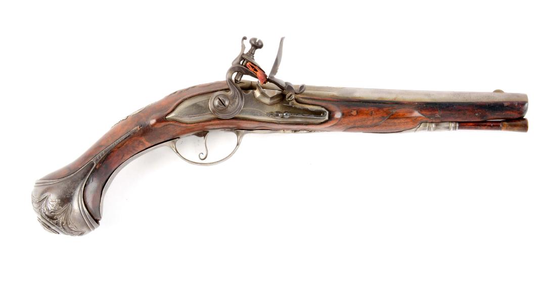 (A) Continental Flintlock Officer's Pistol.: Tapered smooth bore steel barrel with flat rib on top and chiseled designs at breech. Early engraved flintlock lockplate. Steel mounted furniture including pierced and chiseled sideplate, chiseled wri