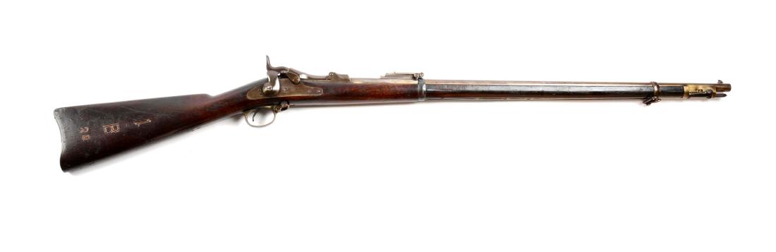 (A) U.S. Springfield Model 1888 Rod Bayonet Rifle.: These were manufactured 1889 to 1893 with approximately 65,000 made. One piece trigger guard, grooved and knurled trigger, trapdoor buttplate, 1884 rear sight, two barrel bands with sling swivels mark