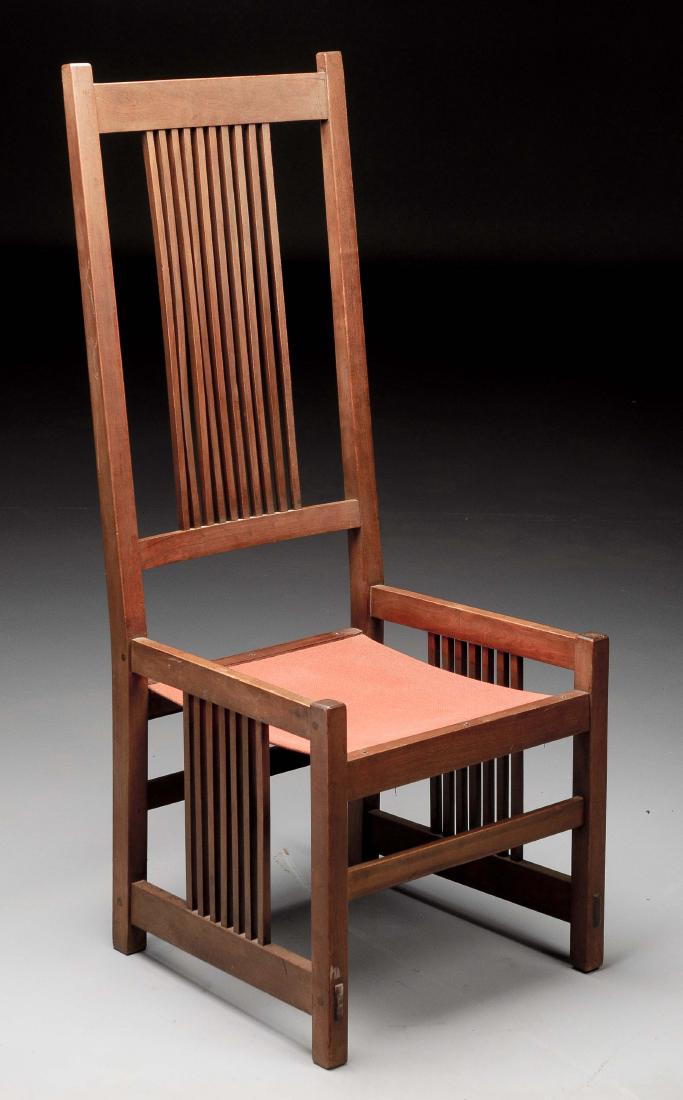 Gustav Stickley Tall Back Spindle Chair No. 374.: Gustav Stickley tall back spindle chair with sling seat for loose cushion. Pinned mortise and tenon construction with through tenons in mahogany. Enhanced original finish. Loose cushion is not present