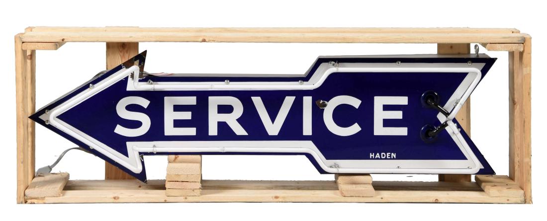 (Ford) Service Arrow Shaped Neon Sign.: SSP sign. Good color and gloss with a chip in the field and one on the arrow. Mounted on new can with new neon tubing. Works well. Marked Haden. (8). 15" x 48" x 10".