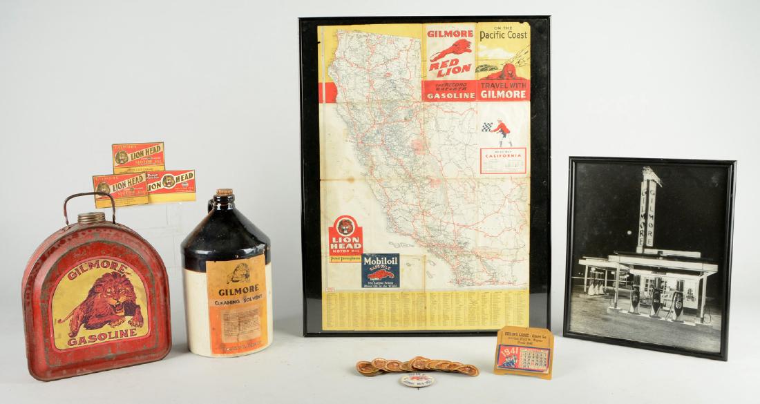 Lot Of 10: Various Gilmore Gasoline Paper: A framed map, photograph, various pins, mileage cards, and a stack on mileage reminder decals. The large crock bottle and gas can appear to not Gilmore items but pieces with Gilmore decals placed on t