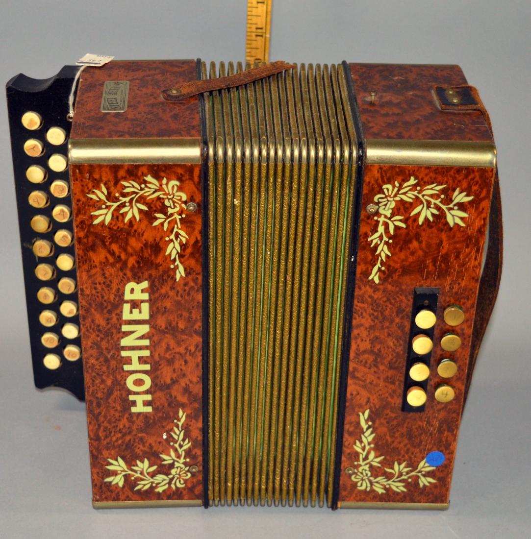 Hohner small accordion Plays: Hohner small accordion Plays