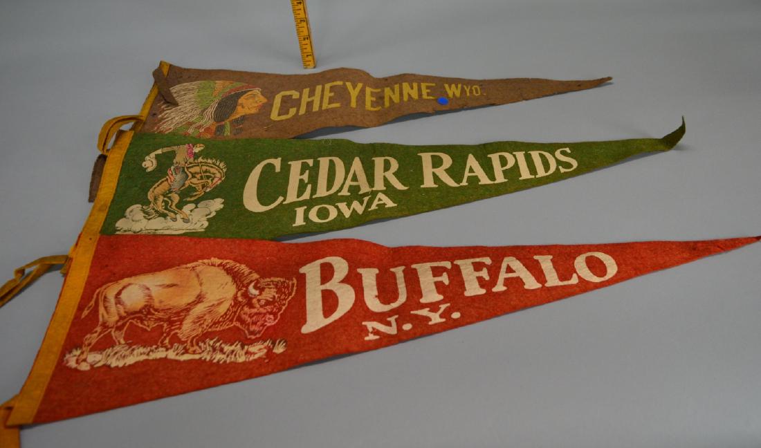 Pennants 3 wool Cowboy Cheyenne Wyo. Has damage: Pennants 3 wool Cowboy Cheyenne Wyo. Has damage. Buffalo pennant has a missing tassel