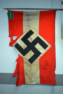 Nazi Youth "Landjahr" flag: From a girl's summer camp. Flag detached from poles. Heavy wear throughout. Signed by American soldiers throughout. 67" x 44". "Landjahr" patch on both sides.