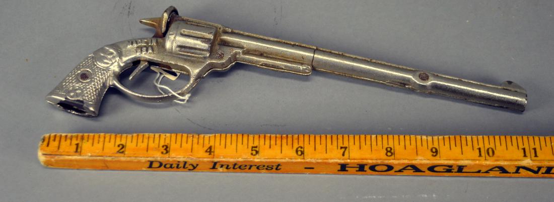 "Long Boy" cap gun: Wear throughout