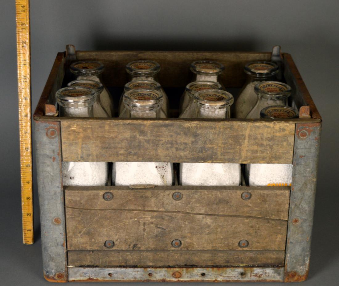 Wood milk crate with 12 bottles: Including Sweet Clover Dairy (Repere, WI) and Cowan Farms (Oshkosh, WI)