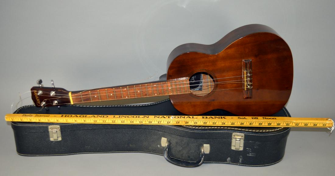 Giannini tenor acoustic guitar: Good condition. Case with wear. Needs restringed.