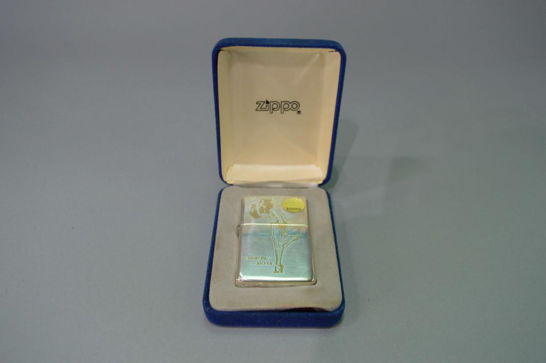 1997 Zippo Sterling Silver Lighter: A 1997 Zippo sterling silver lighter, mint condition in original box and wrapping. Please review the images for condition and dimensions.