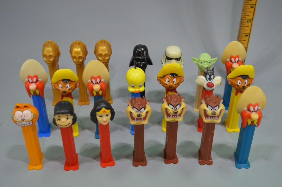 22 PEZ Dispensers: 22 PEZ dispensers. Please review the images for condition and dimensions.