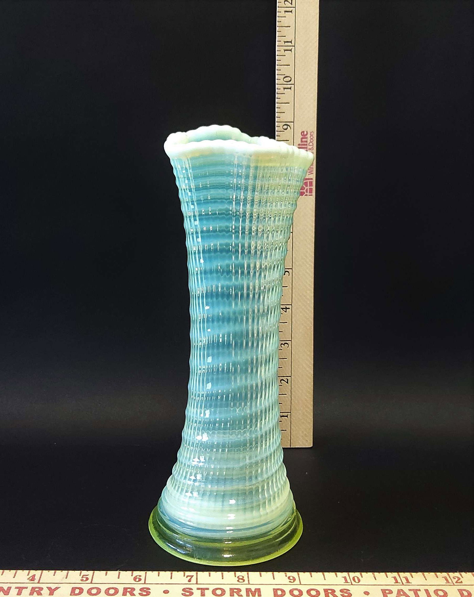 Vaseline Opalescent Glass Vase: A vaseline opalescent glass vase