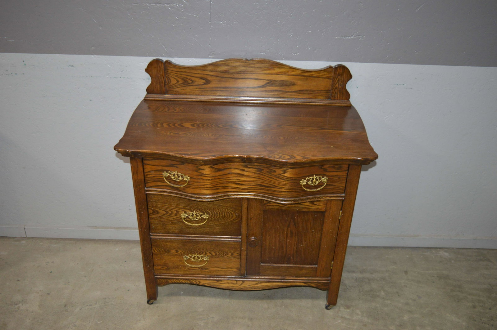 Victorian Oak Commode: A Victorian oak commode. Dimensions: 36 inches high x 34 inches x 19 inches deep.