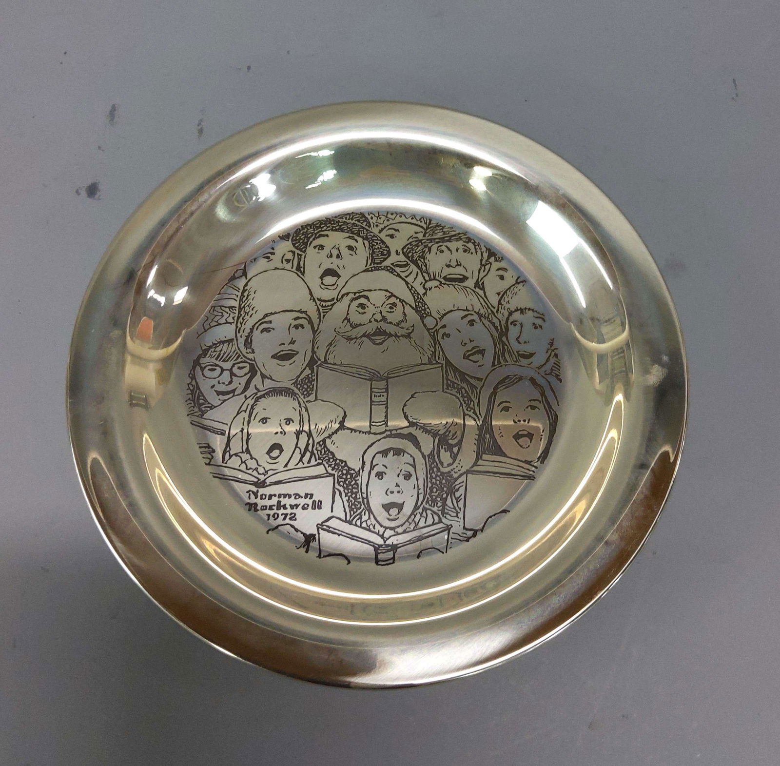 Franklin Mint Sterling Silver Norman Rockwell Plate: A Franklin Mint sterling silver Norman Rockwell plate, weighing 200 grams. Good condition. Please review the images for condition and dimensions.