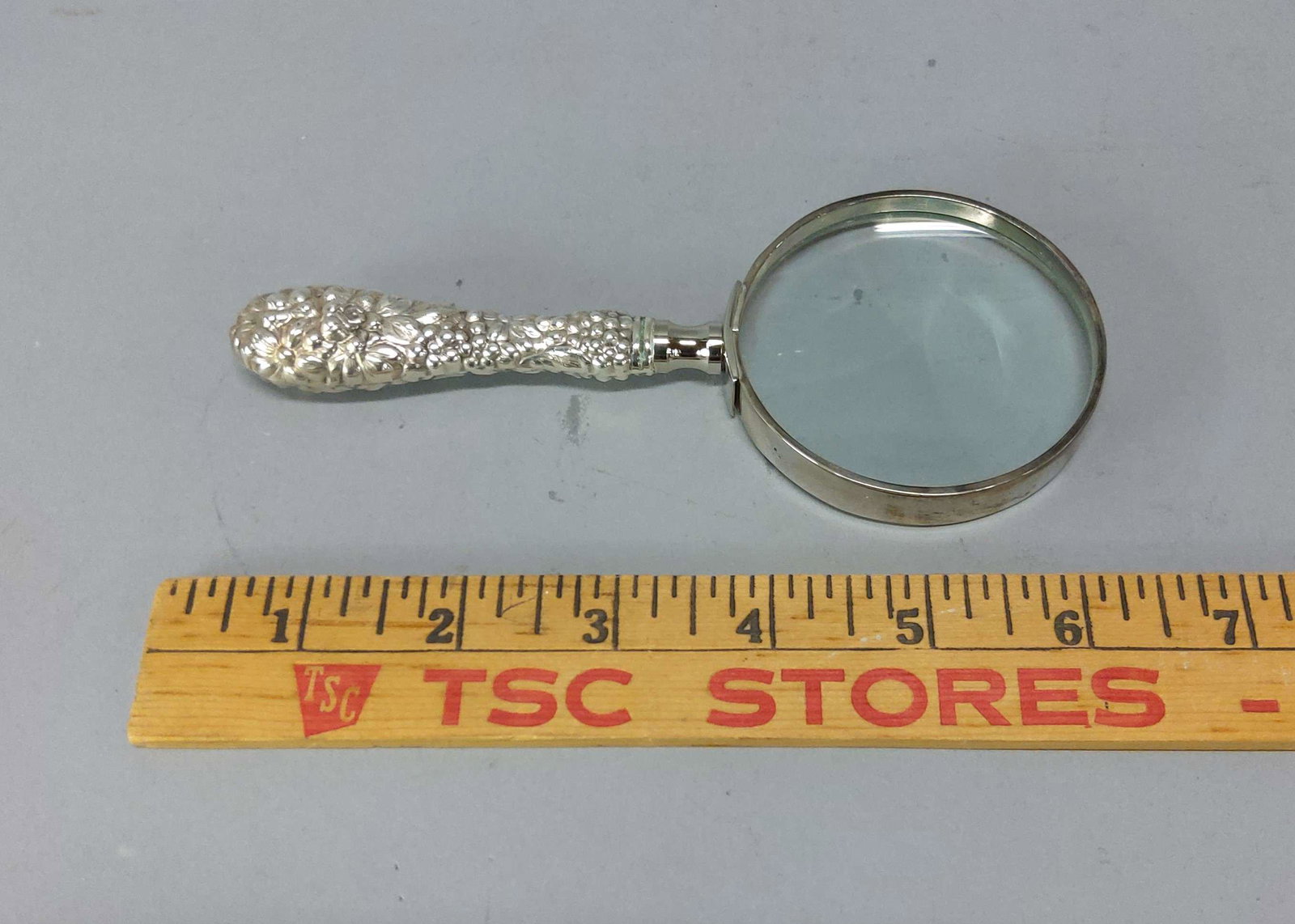 Sterling Handled Magnifying Glass: A sterling silver handled magnifying glass. Good condition. Please review the images for condition and dimensions.