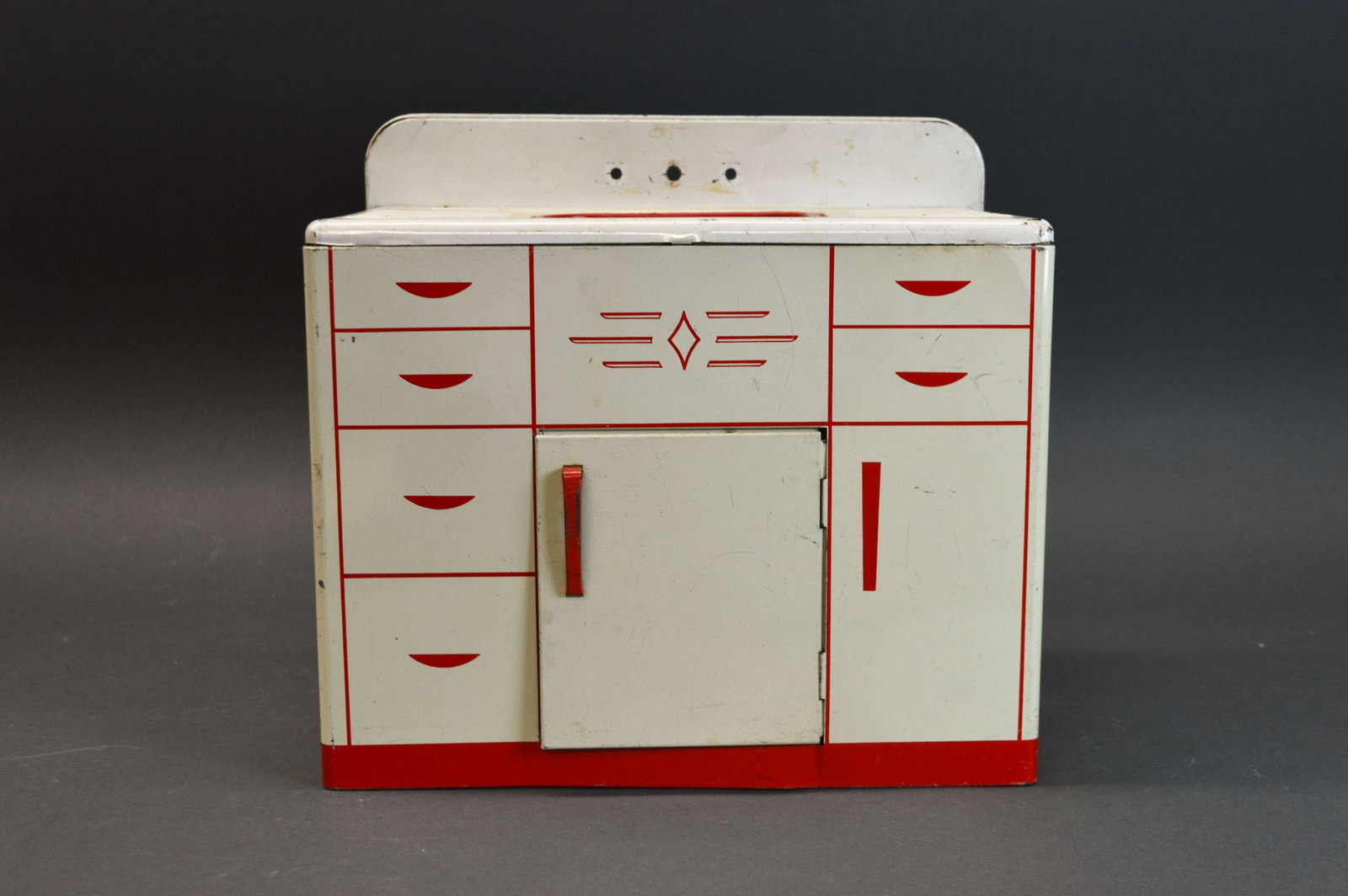 Vintage Tin Litho Toy Sink: A vintage tin litho toy sink.