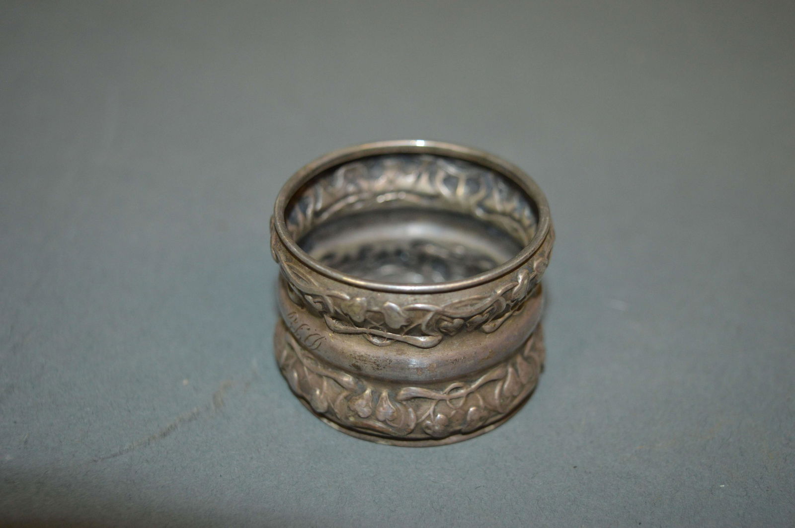 Sterling Silver Napkin Ring: A sterling silver napkin ring, weighing 15 grams.
