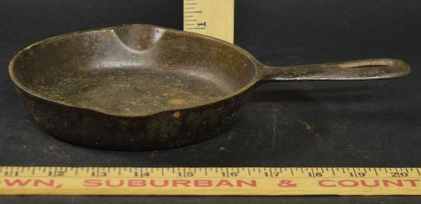 Griswold #3 Cast Iron Skillet Slant Logo: A Griswold #3 cast iron skillet with slant logo, pattern 709 A