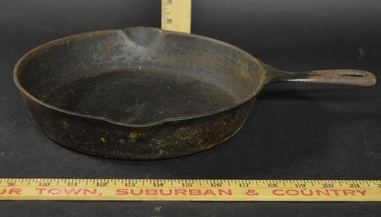 Griswold #8 Cast Iron Skillet Slant Logo: A Griswold #8 cast iron skillet with slant logo, pattern 704 J