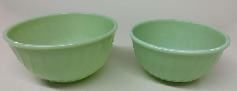 2 Fire King Jadeite Swirl Mixing Bowls: Two Fire King Jadeite swirl mixing bowls.