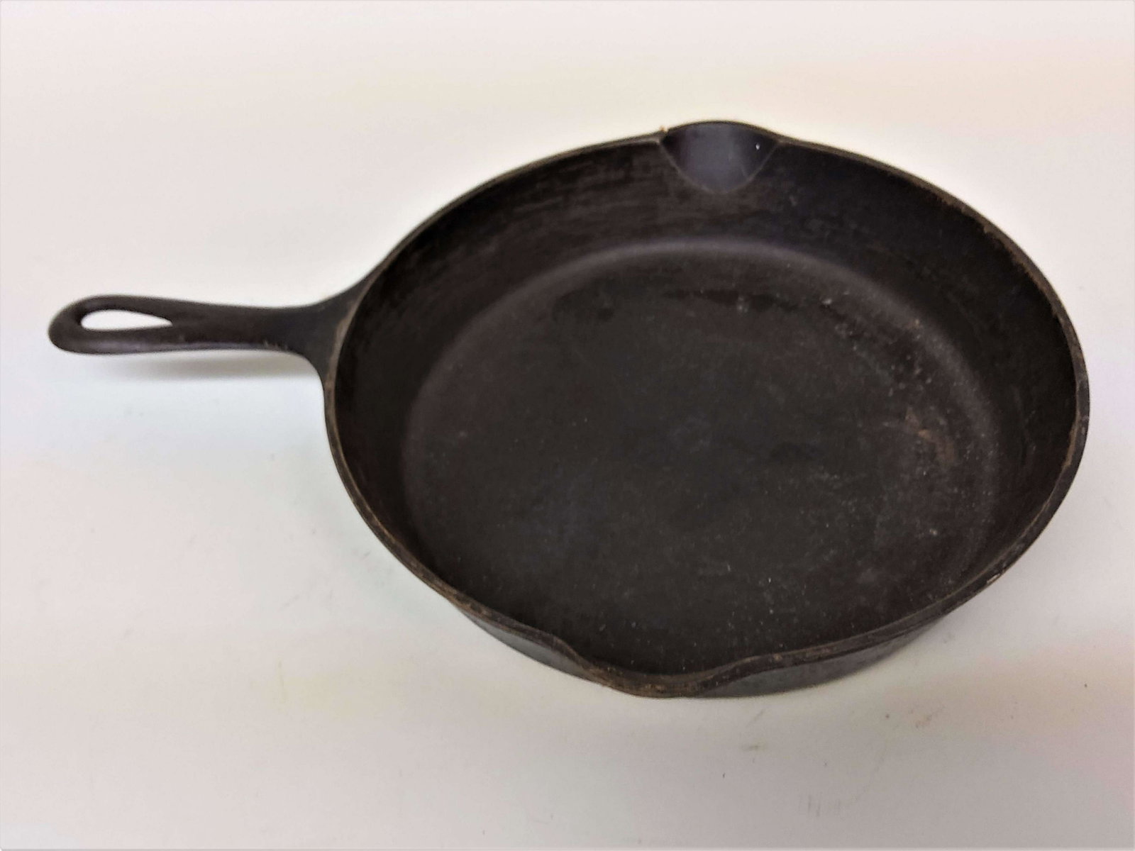 Griswold Cast Iron #8 Skillet: A Griswold cast iron #8 skillet, pattern 704