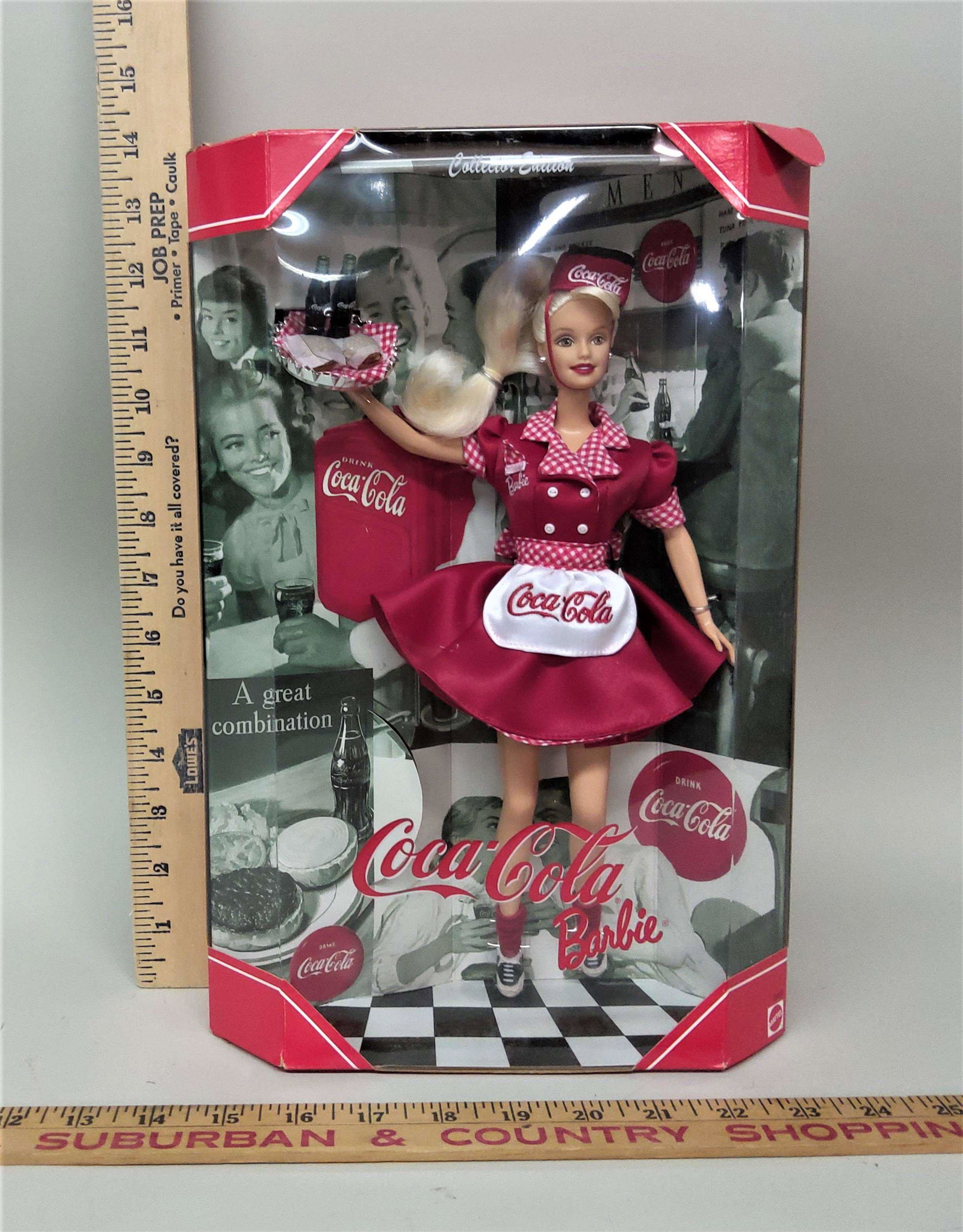 Collector Edition Coca-Cola Barbie Doll: A Collector Edition Coca-Cola Barbie doll.