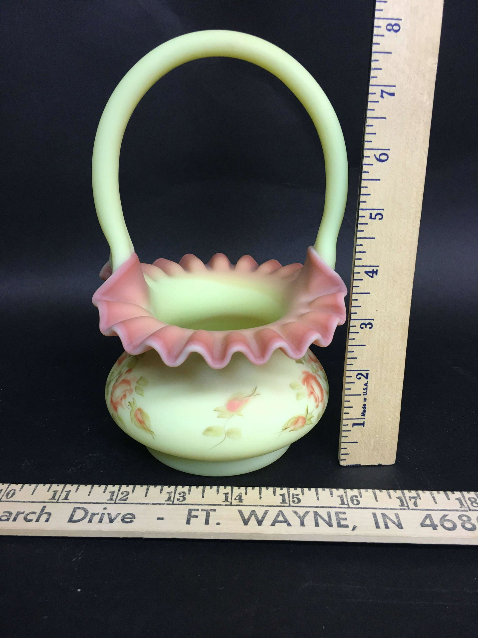 Fenton Hand Painted Burmese Glass Basket Artist Signed: An artist signed Fenton hand painted Burmese glass basket.