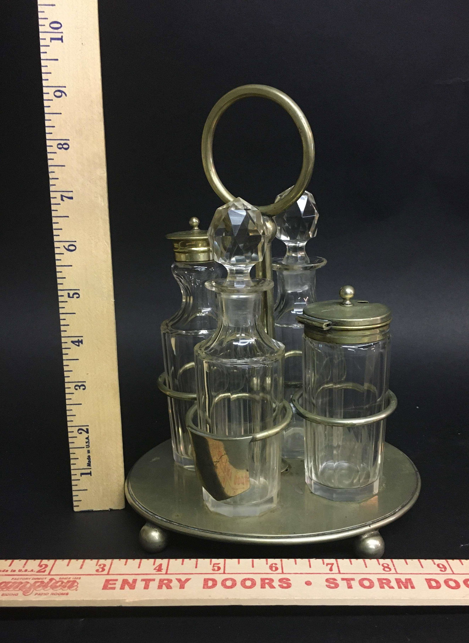 Edwardian English Silverplate & Cut Glass Castor Set: An Edwardian era English silverplate and cut glass castor set.