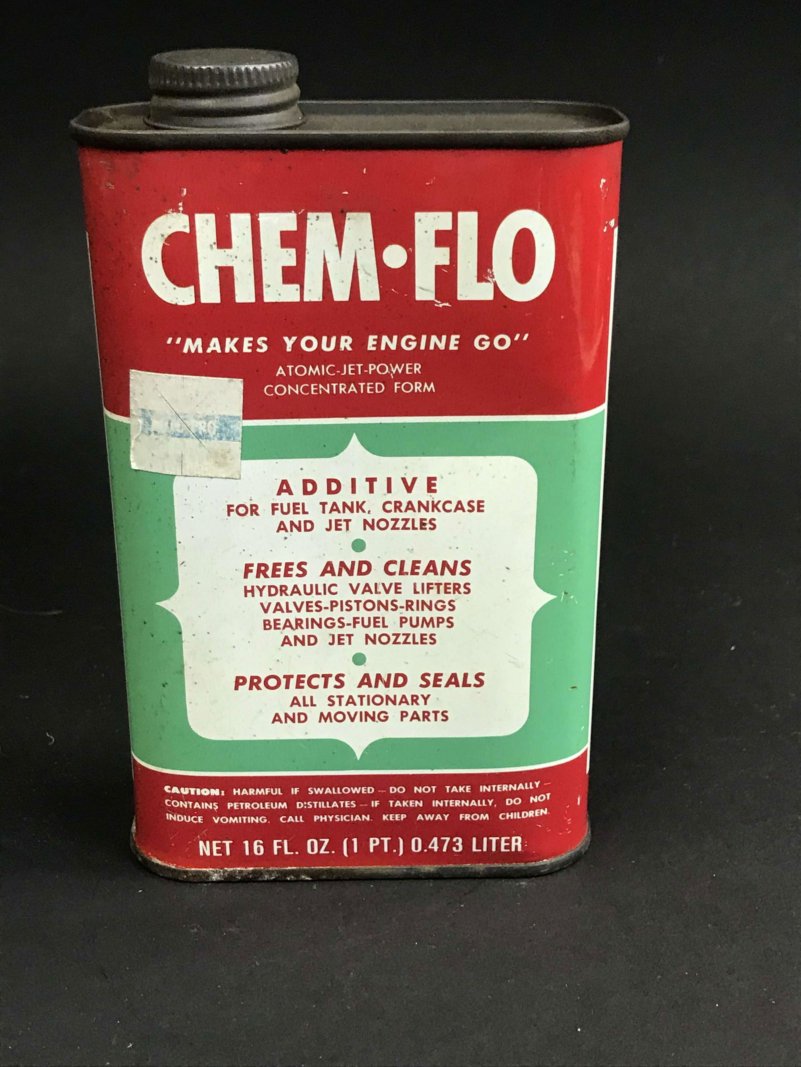 Chem-Flo Fuel Additive Can: A partially full Chem-Flo fuel additive can.
