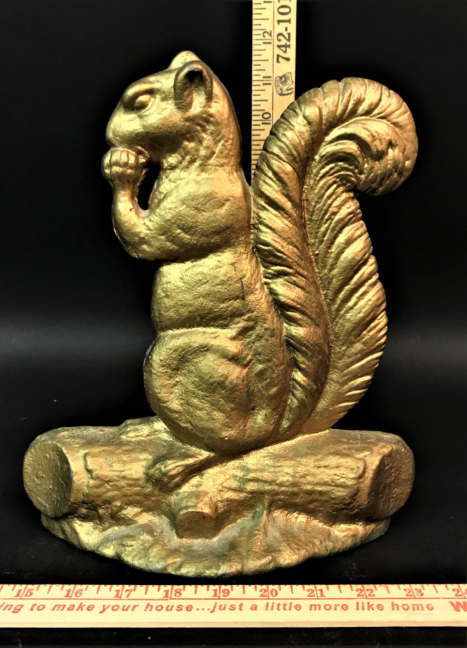 Cast Iron Squirrel Door Stop: A cast iron squirrel door stop.