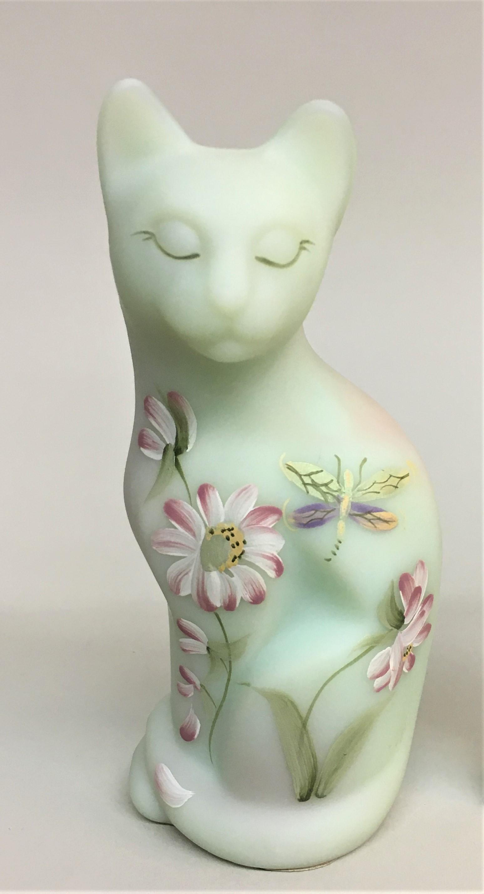 Fenton Artist Signed Lotus Mist Burmese Glass Cat: A Fenton hand painted artist signed "lotus mist" Burmese glass cat figurine.