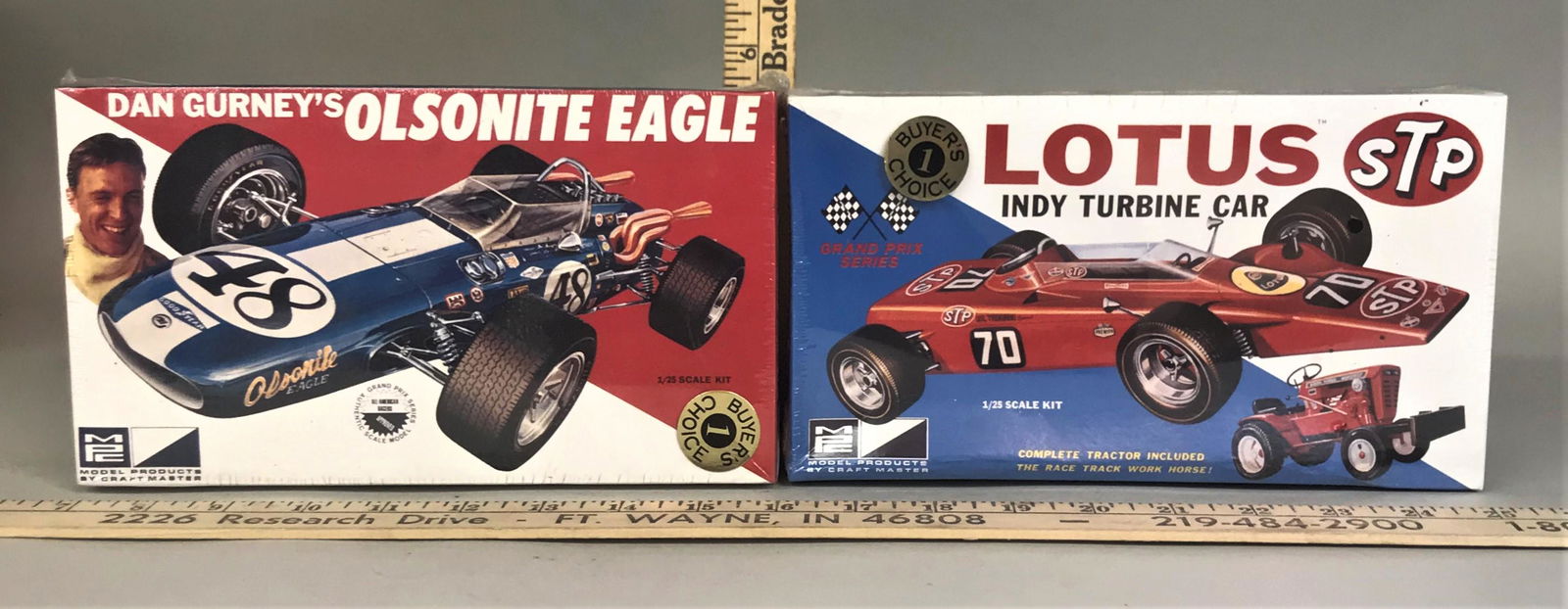 2 AMT Ertl 1:25 Model Kits STP Lotus Olsonite Eagle: 2 AMT Ertl 1:25 model kits including STP Lotus Indy Turbine Car & Dan Gurney's Olsonite Eagle