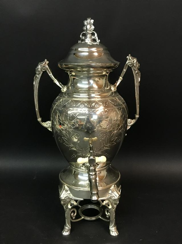 Victorian Silverplate Samovar Hot Water Dispenser: A Victorian era Renaissance Revival hot water dispenser.