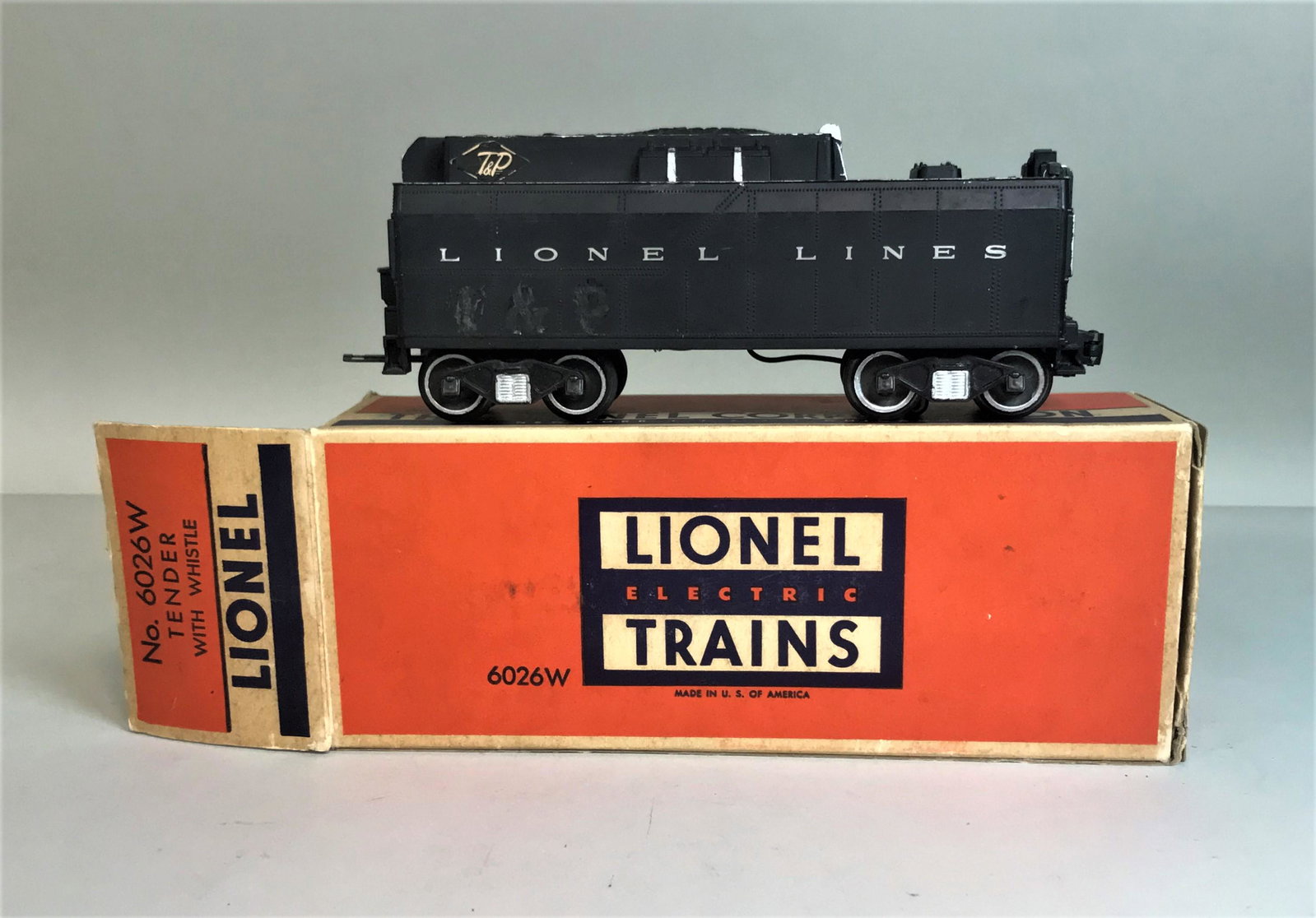 Vintage Lionel 6025W Tender With Whistle: A vintage Lionel No. 6026W Tender with Whistle, in original box.