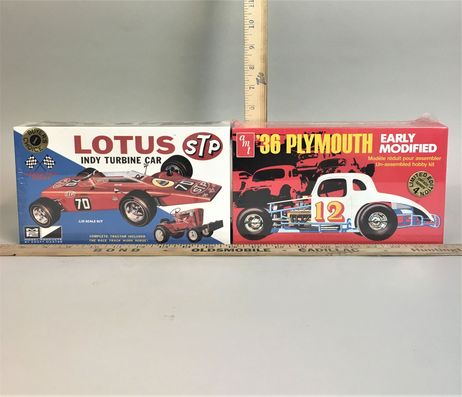 2 Model Kits AMT Ertl 36 Plymouth Lotus Indy Turbine: 2 AMT Ertl model kits including 1:25 Lotus Indy Turbine Car & '36 Plymouth