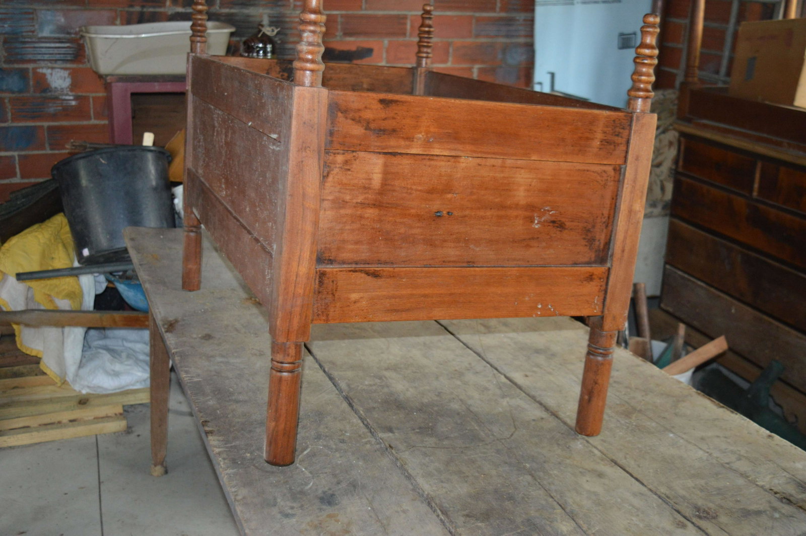 Early 19th century crib. Dimensions: 27.5" high x: Early 19th century crib. Dimensions: 27.5" high x 36.25" long x 23"