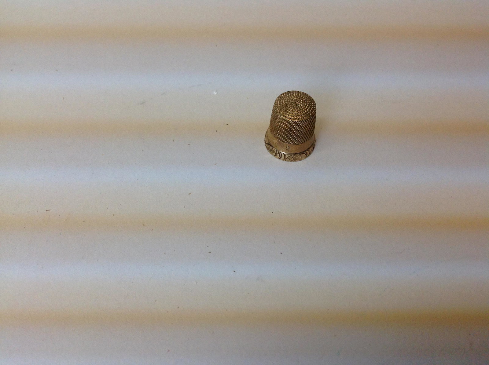 10K Gold Thimble: A 10k gold thimble. Weight: 3.1 grams