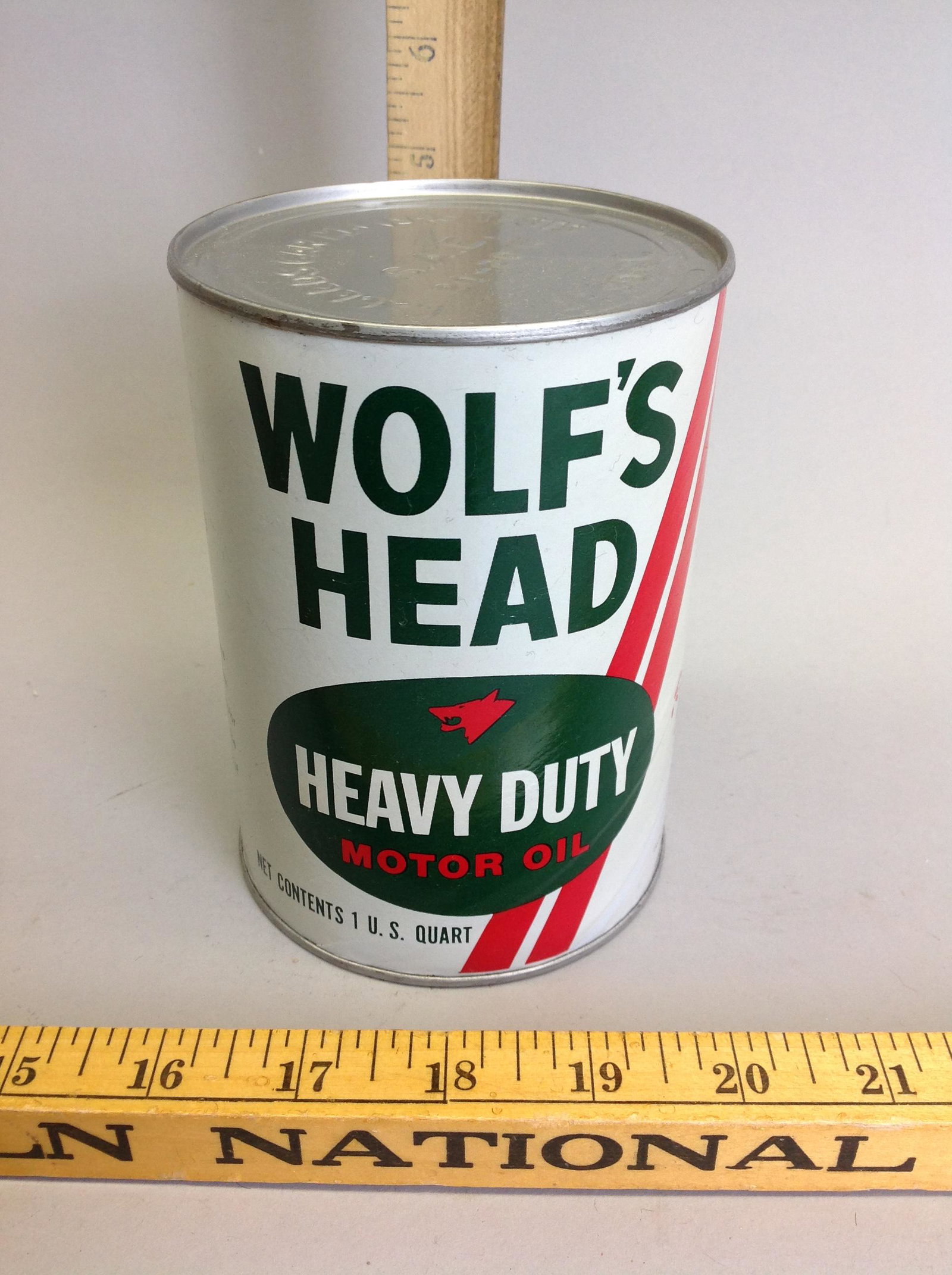 Wolf's Head Motor Oil 1 Quart Paper Can: A Wolf's Head Motor Oil 1 quart paper can