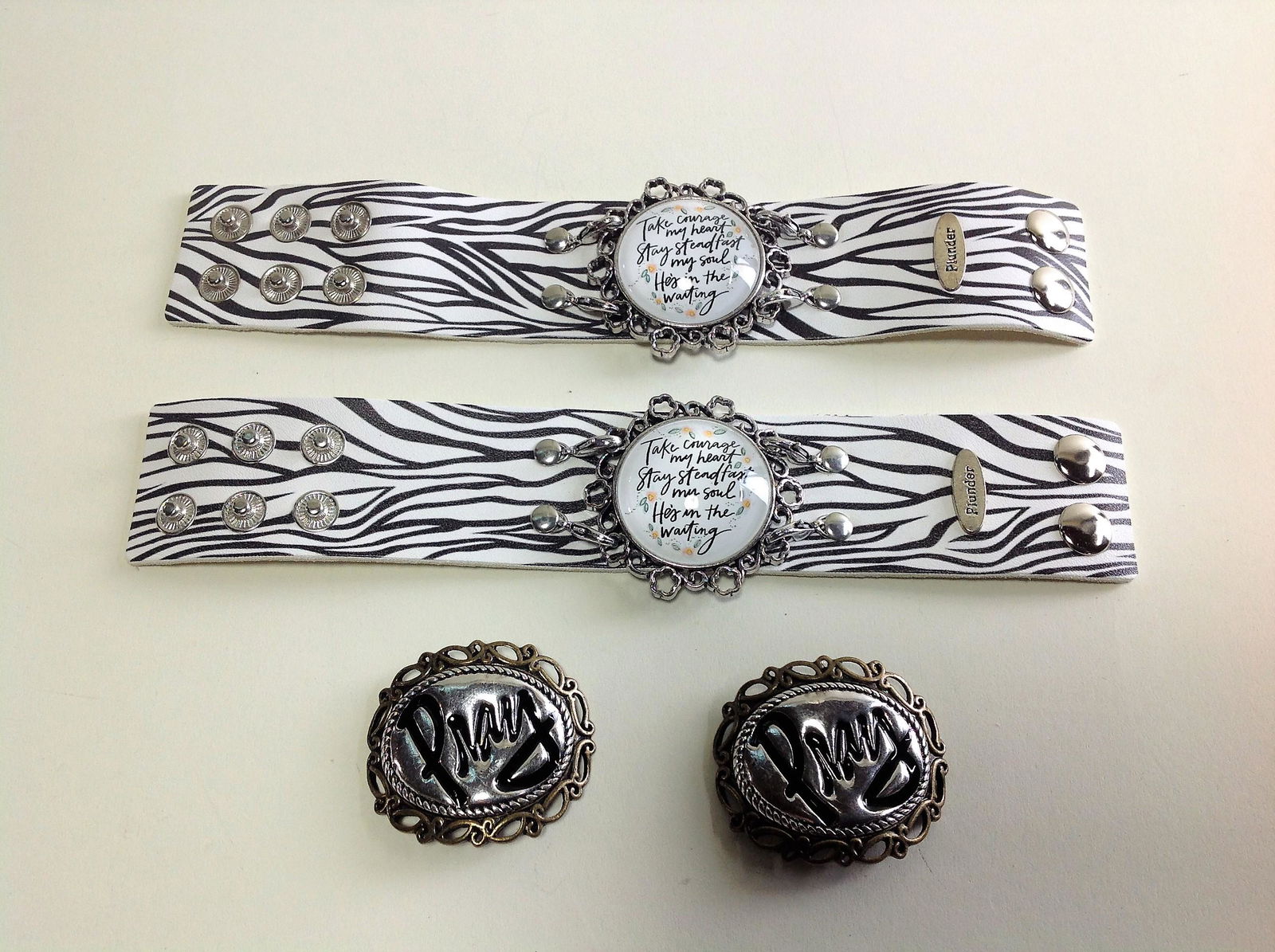2 Plunder Bracelets: 2 Plunder bracelets with interchangeable medallions