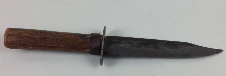 19th Century Knife: A 19th century knife. 6in blade. 12 in with handle.