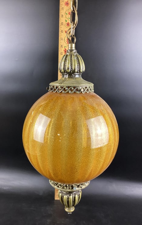 Vintage Mid Century Amber Honey Comb Globe Ball Hanging Light Center Piece Fixture: Mid Century Vintage Amber Honey Comb Plasmic Globe Ball Hanging Light Center Piece Fixture, Globe features detailed honey comb plasmic finish with brass metal hardware with vintage embellishments, Dim