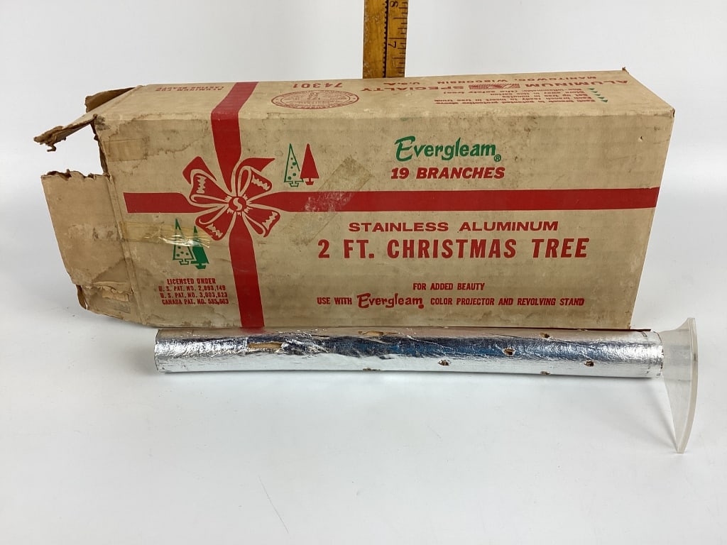 Vintage Evergleam Aluminum Christmas Tree: Vintage Evergleam Aluminum Christmas Tree, 19 Branch Aluminum Tree Height: 2ft. Pom Pom Branches, Weyerhaeuser Company Aluminum Specialty Manitowoc, WisconsinAll branches are accounted for.